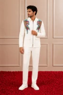Featuring Ivory bomber jacket in terry rayon blend base with applique embroidery and digital print.